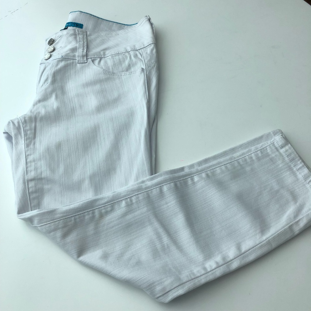 YMI skinny white jeans .Size 9